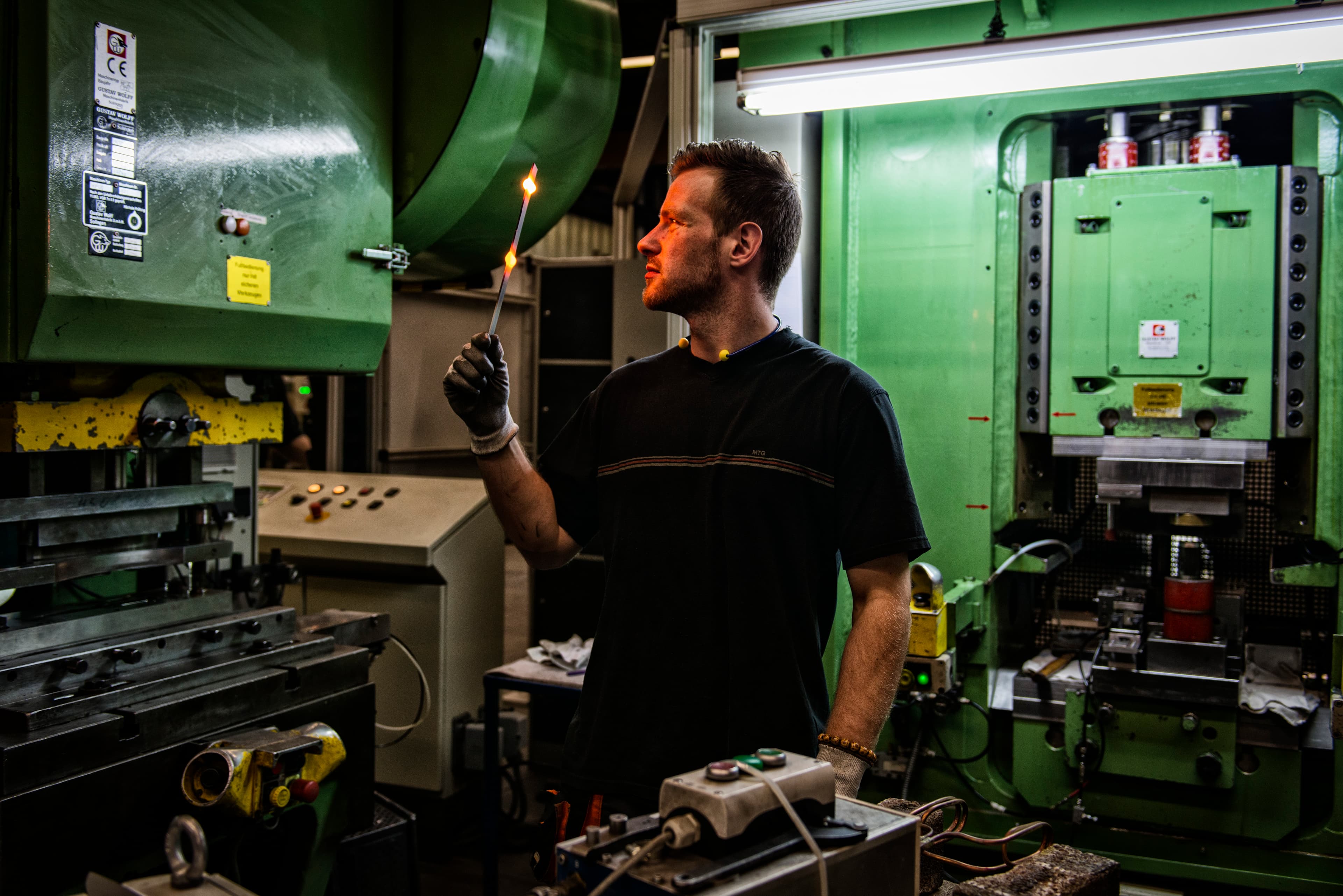 man forging steel in the wusthof factory