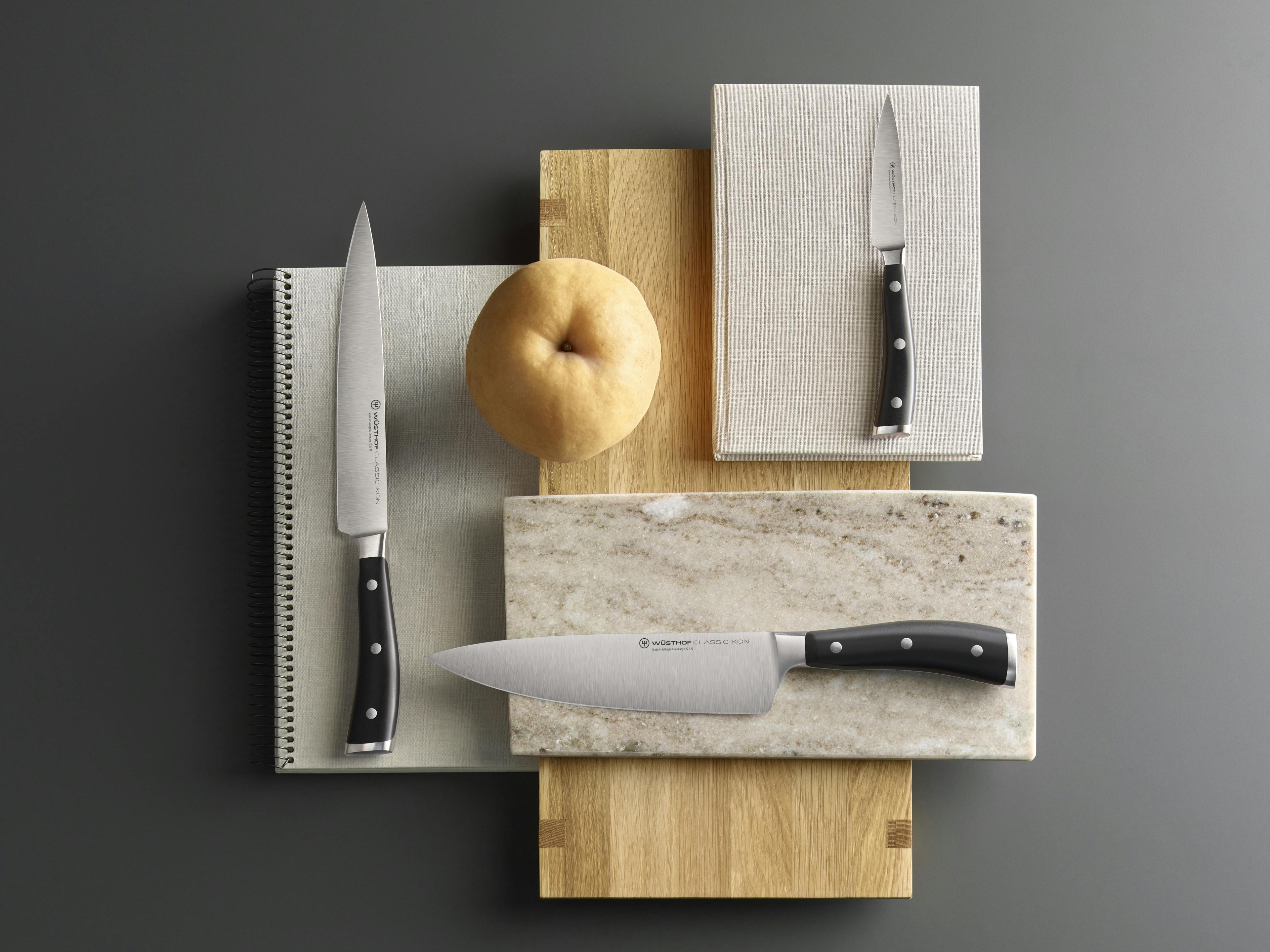 Classic Ikon Knives on cutting board layers