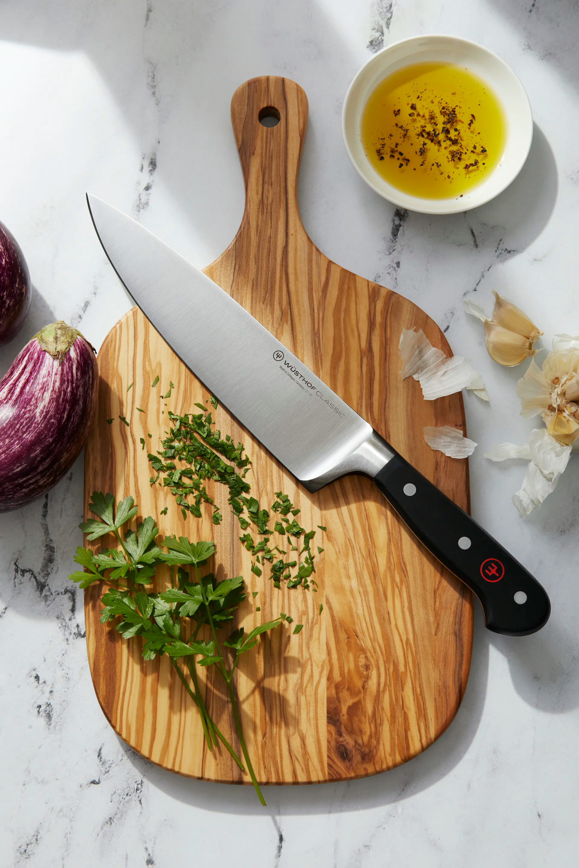 Classic Chef's Knife on a cutting board