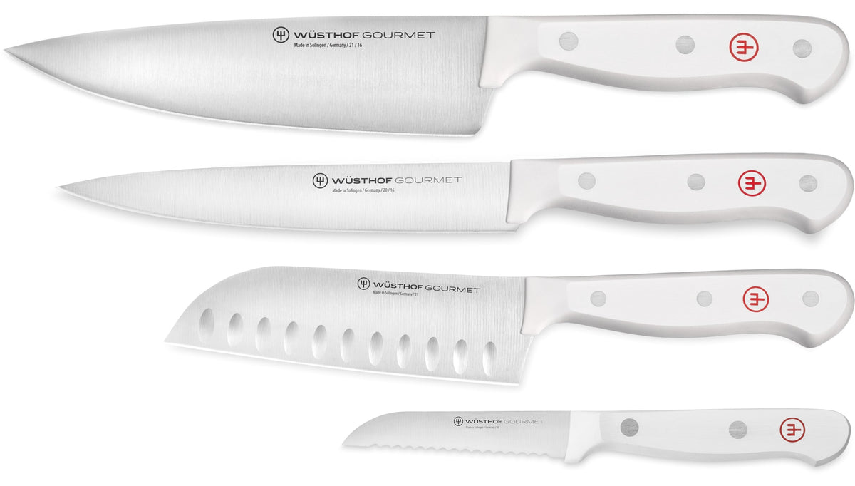 Set of Wüsthof Gourmet knives on a white background