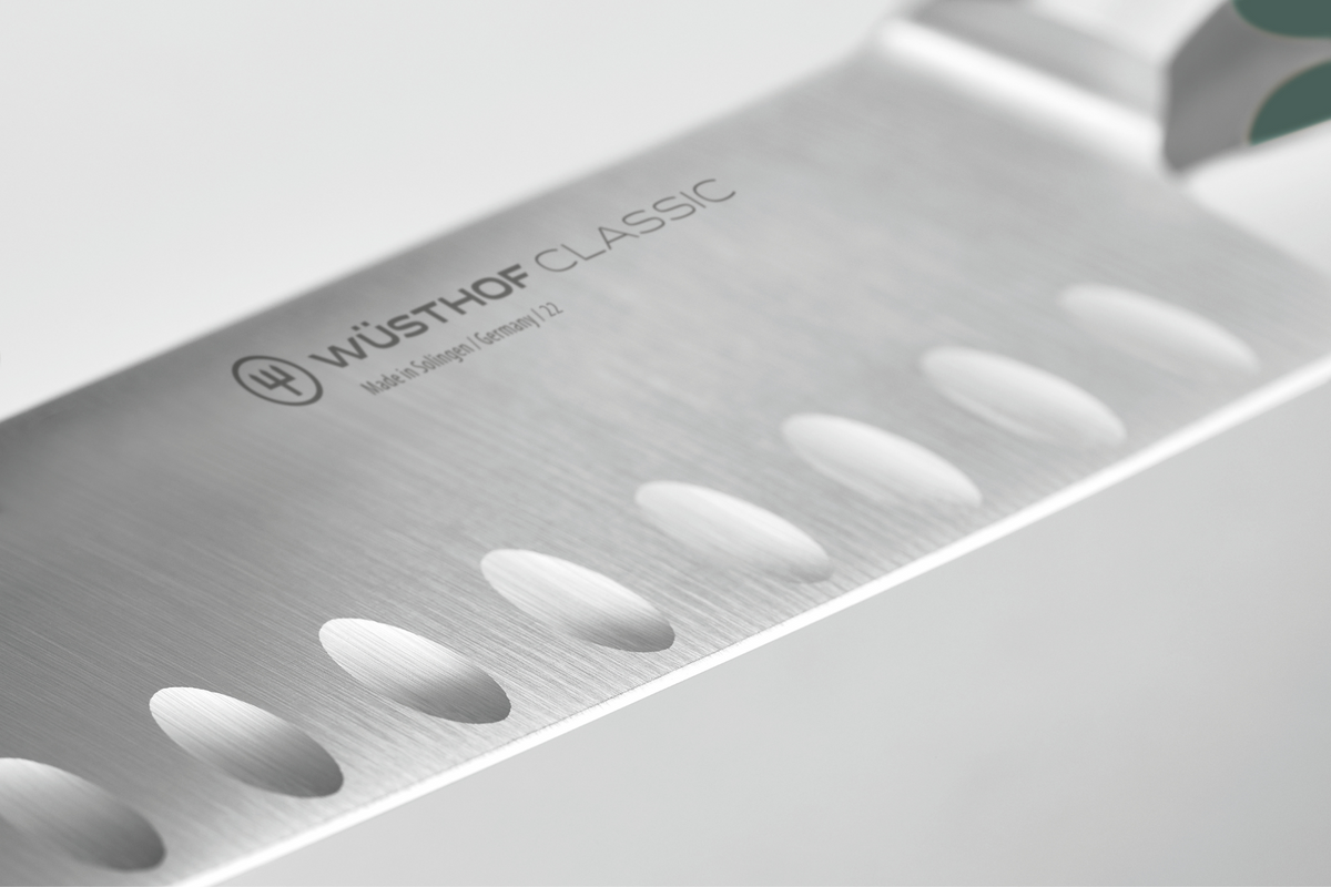 Wüsthof Classic knife blade with brand logo on a white background