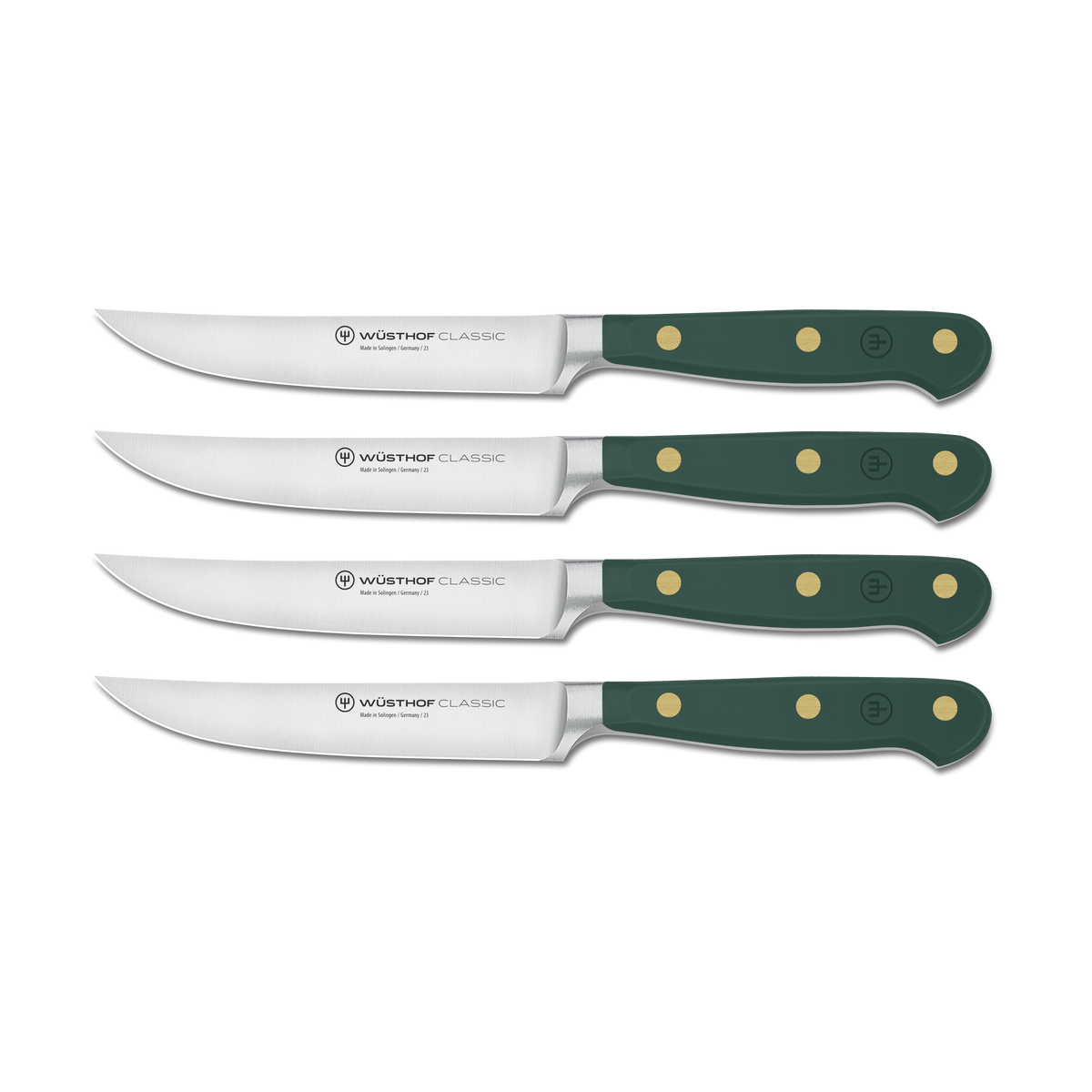Set of four Wusthof Classic steak knives with green handles on a white background