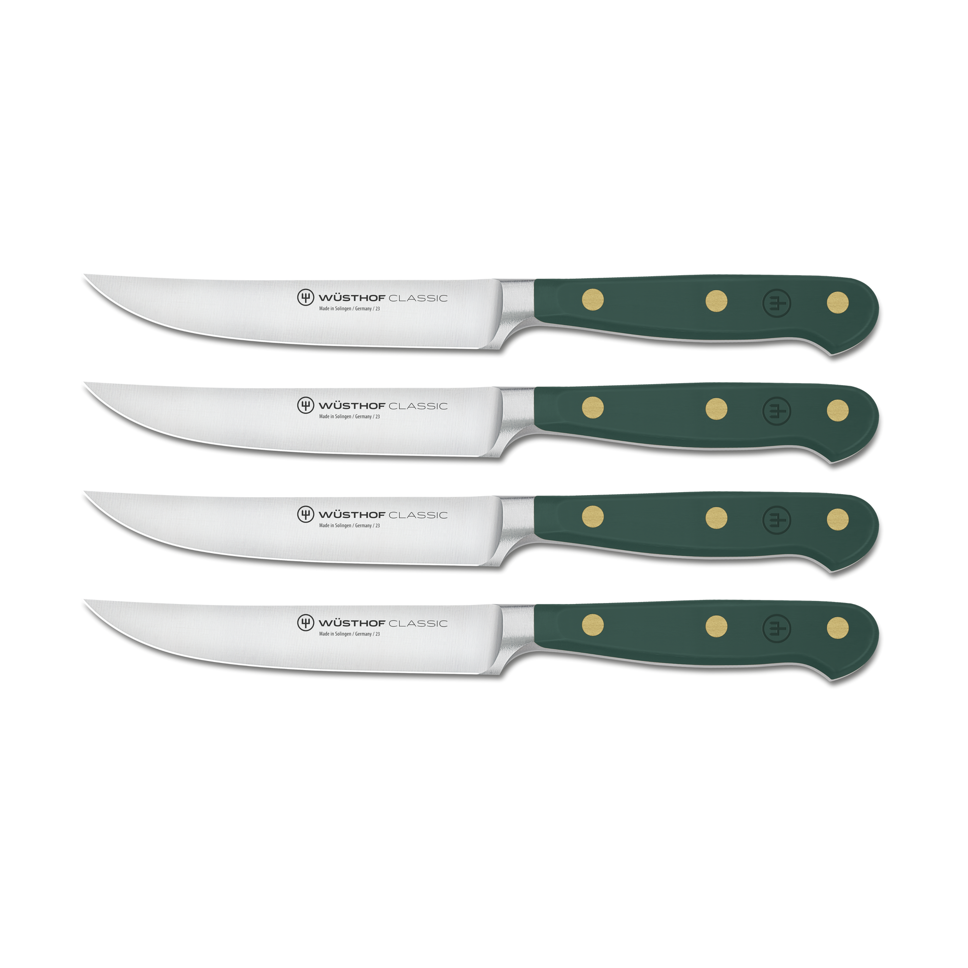 Set of four Wusthof Classic steak knives with green handles on a white background