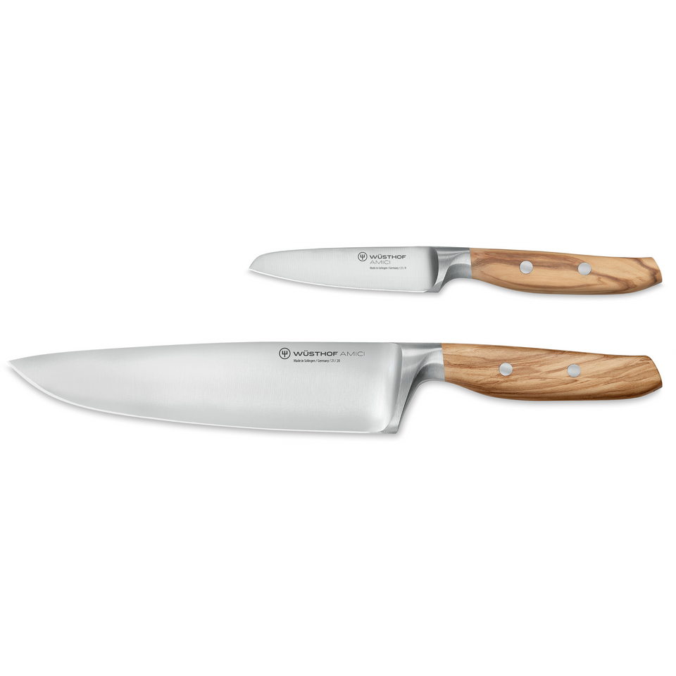 Two knives with wooden handles on a white background