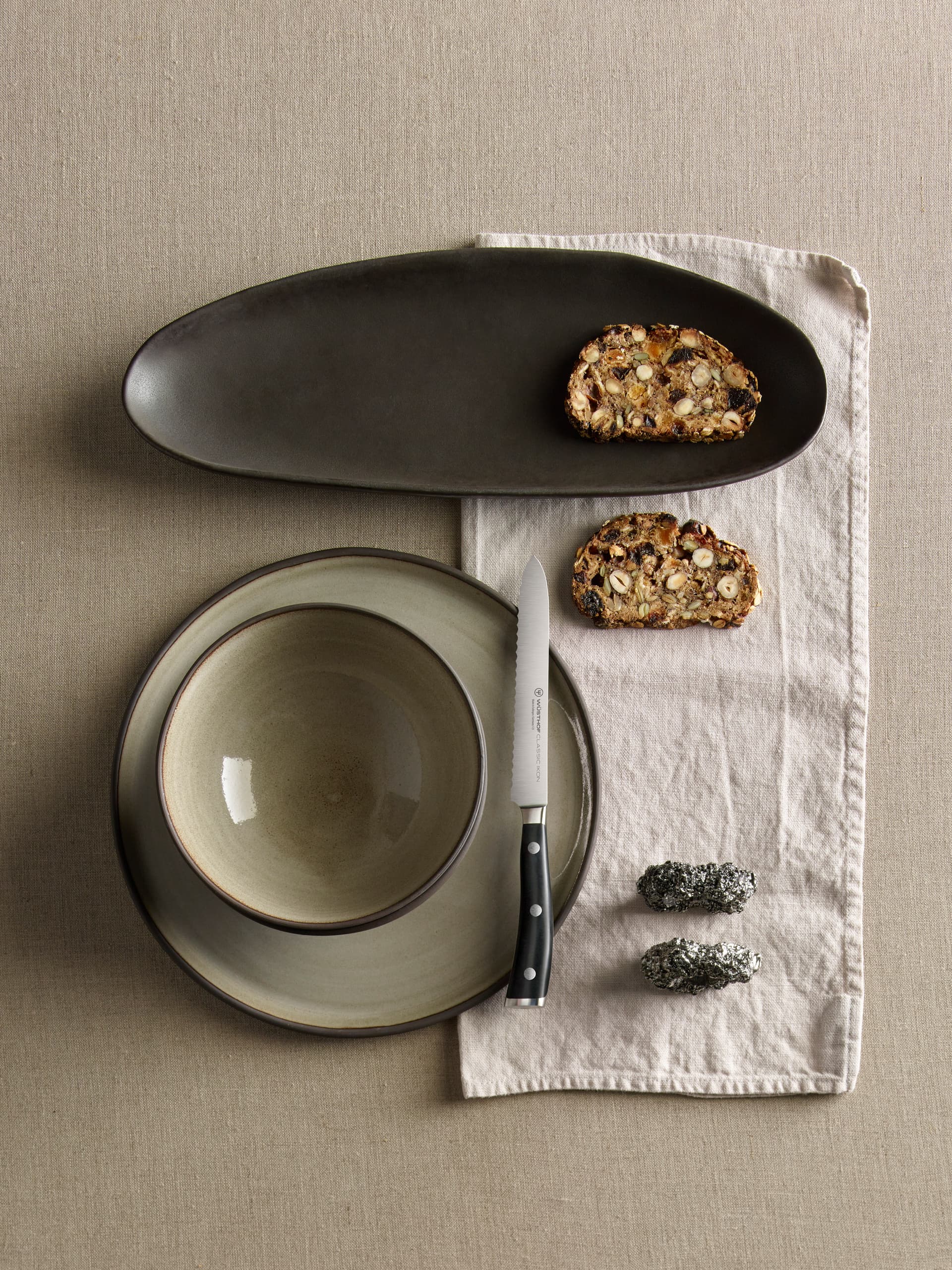knife on plate with bread