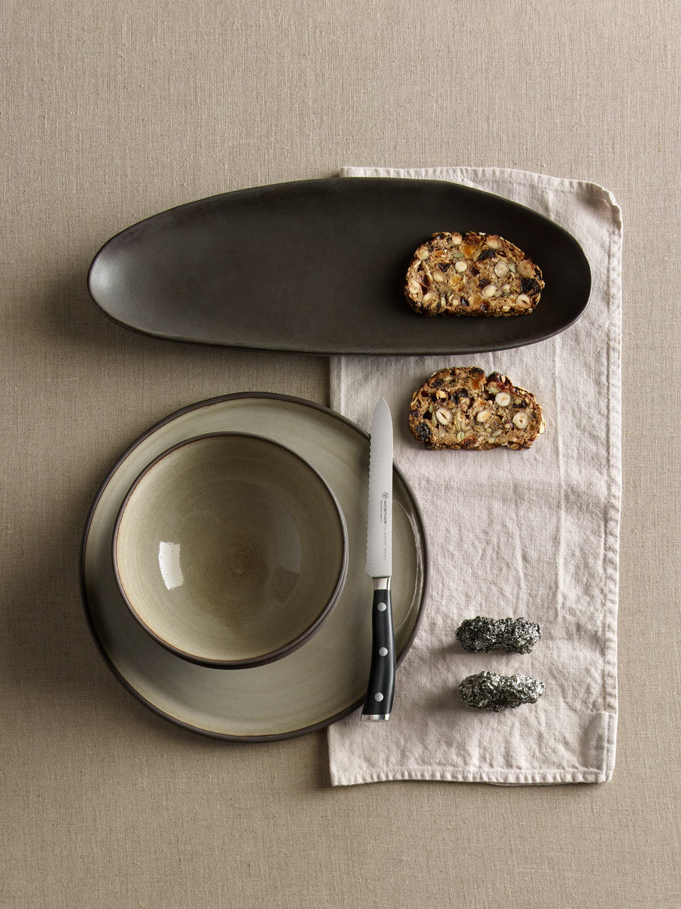 knife on plate with bread