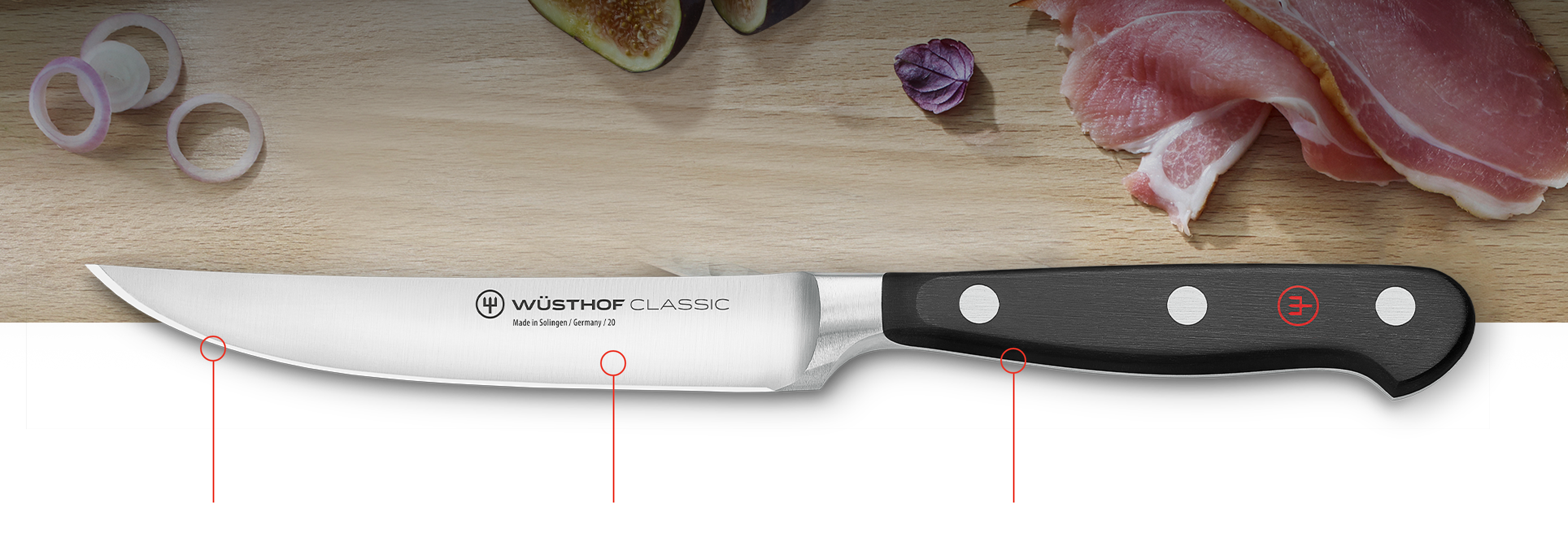 WÜSTHOF steak knife on cutting board with material callouts