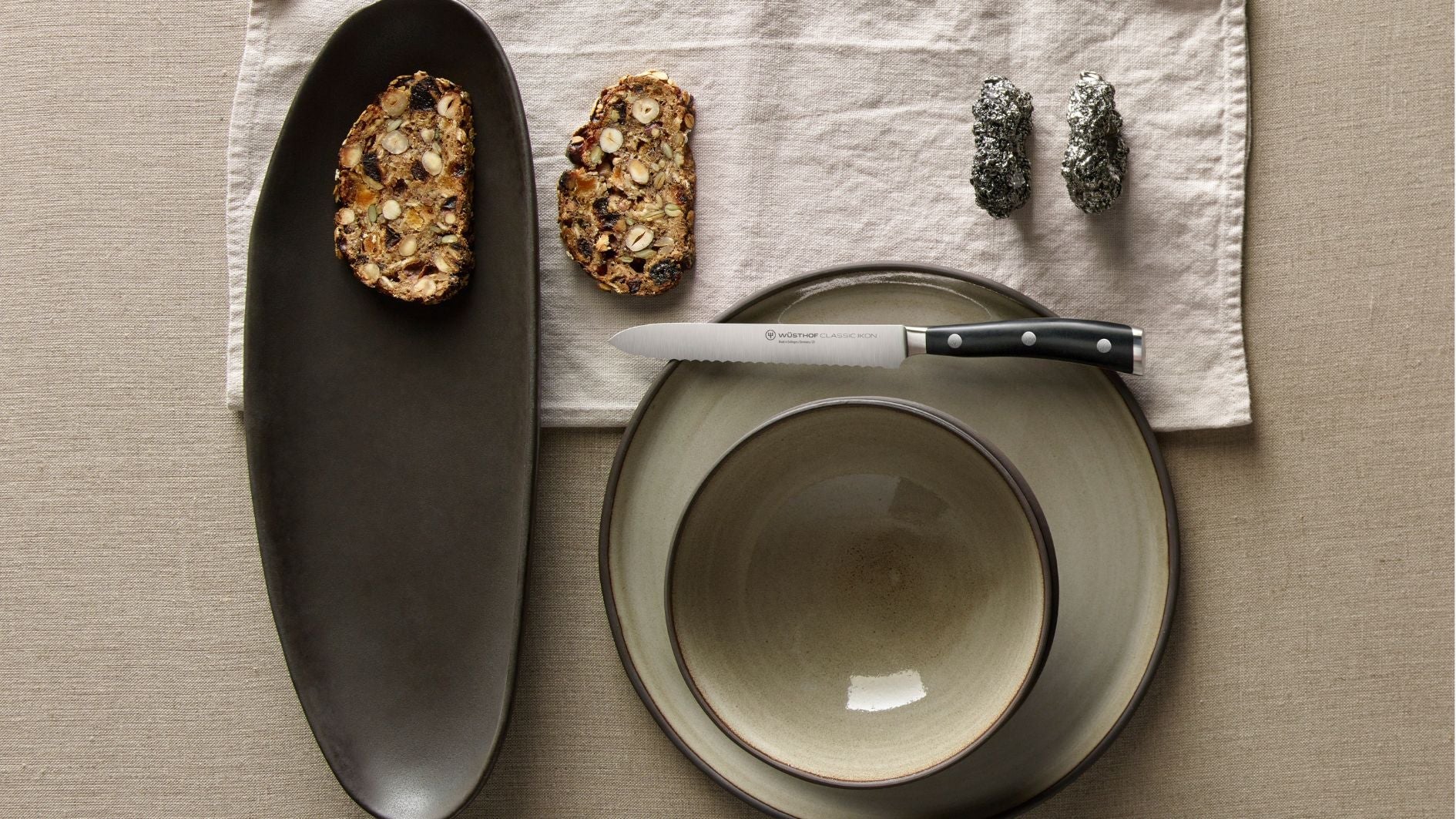 knife on plate with bread