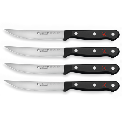 Gourmet 4-Piece Steak Knife Set featuring sharp forged German steel blades with black ergonomic handles and triple-riveted construction for durability and precision.